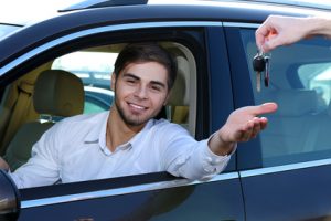 Young man in car